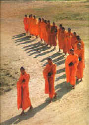 Monks going for alms, their only meal of the day.