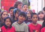 Children from around join the celebration.